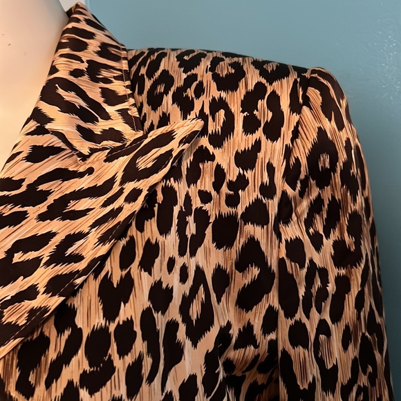 Let your inner animal spirit out with a silk coat dress. - Picture 4 of 9